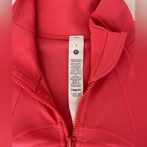 Vibrant pink Lululemon zip up define jacket